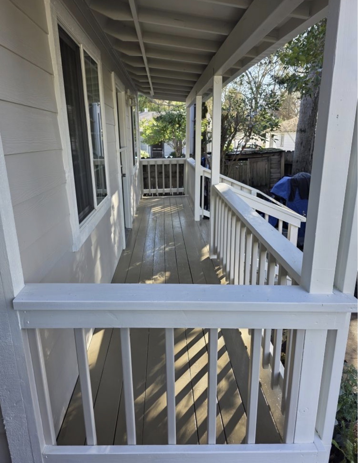 Wraparound porch — clean white finish